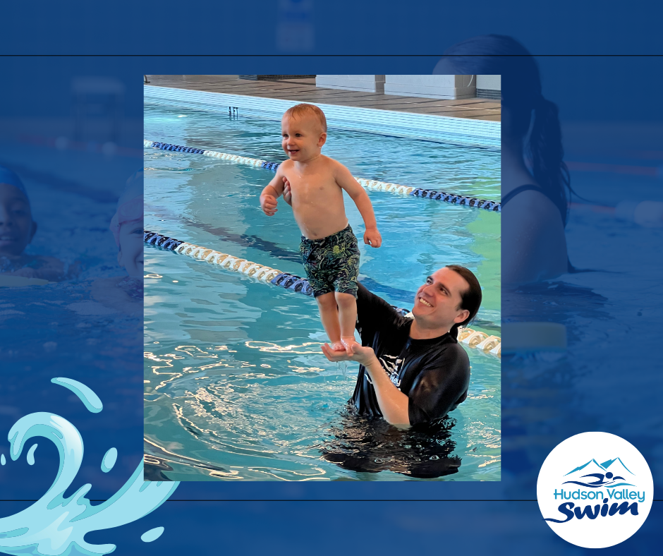 instructor holding up child in pool