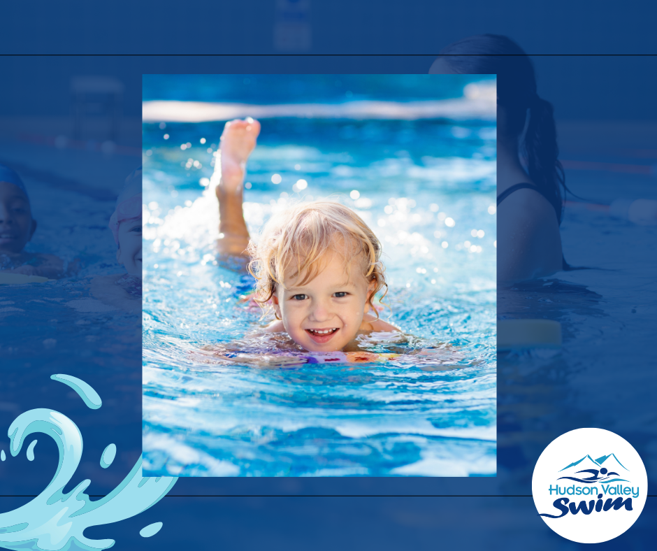 a little girl swimming in a pool