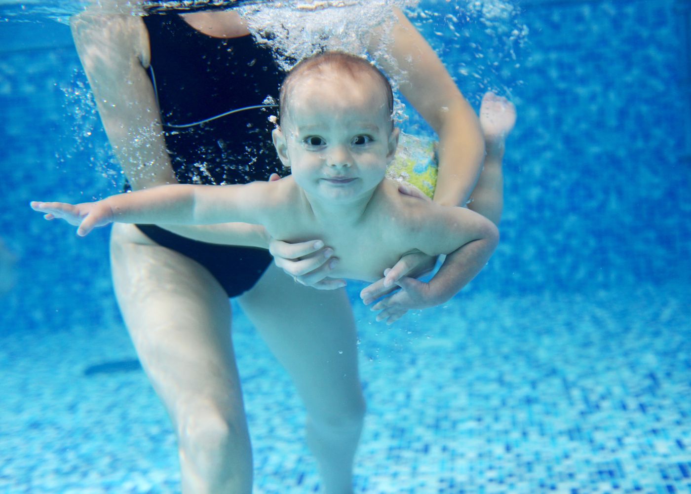 a baby getting swim lessons with hudson valley swim